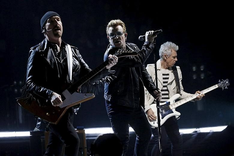 U2's (from far left, the Edge, Bono and Adam Clayton) concert on Sunday was the first large-scale cultural event in Paris since the Nov 13 terrorist attacks.