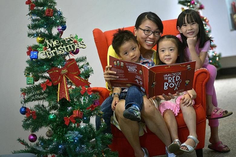 Ms Phua San San (above) hopes her book What's Inside The Red Box?, the first fully illustrated book about Mr Lee Kuan Yew for very young children, will inspire kids to do their part to make the world a better place.