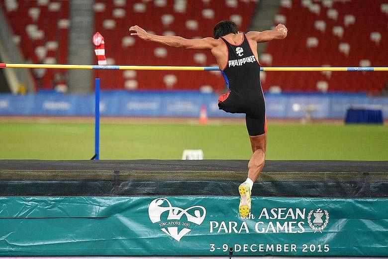 This competitor from the Philippines was the Everyman of the Asean Para Games, putting down his crutch before taking just four hops on one leg and somersaulting over the bar.