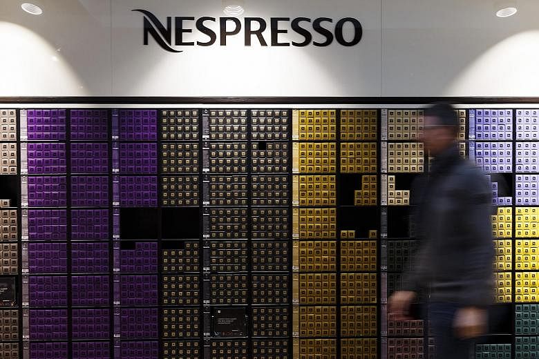 A display of Nespresso coffee capsules at the Nestle SA headquarters in Vevey, Switzerland. Nespresso sells its products in its own boutiques, which are modelled after luxury stores.