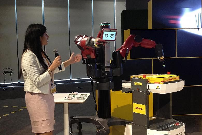 Guests at the launch of the centre were able to see Mr Baxter, a pick-and-pack robot, placing packets of Panadol into a DHL parcel.
