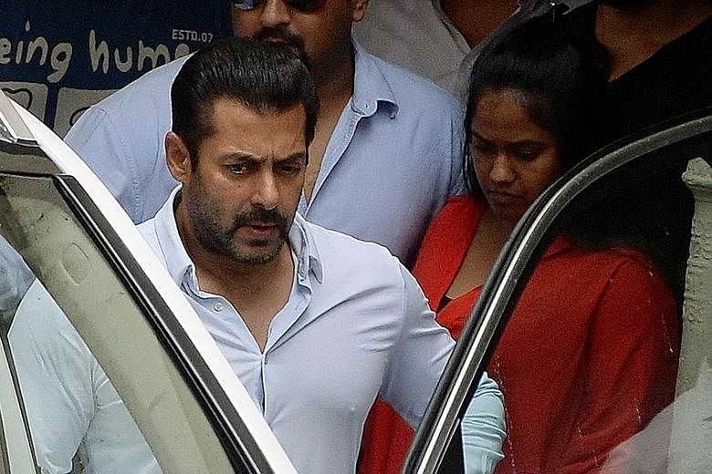 Salman Khan leaving his home before a court appearance in May. He had been convicted of culpable homicide and sentenced to five years in prison but won a High Court appeal yesterday.