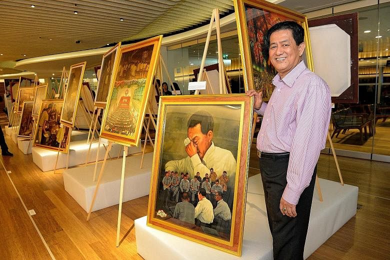 Movie poster painter Ang Hao Sai, 64, with his work, Tears, featuring founding Prime Minister Lee Kuan Yew. It was shown with his other paintings, which depict scenes of Singapore life, at The Art of Singapore, a free exhibition launched yesterday at
