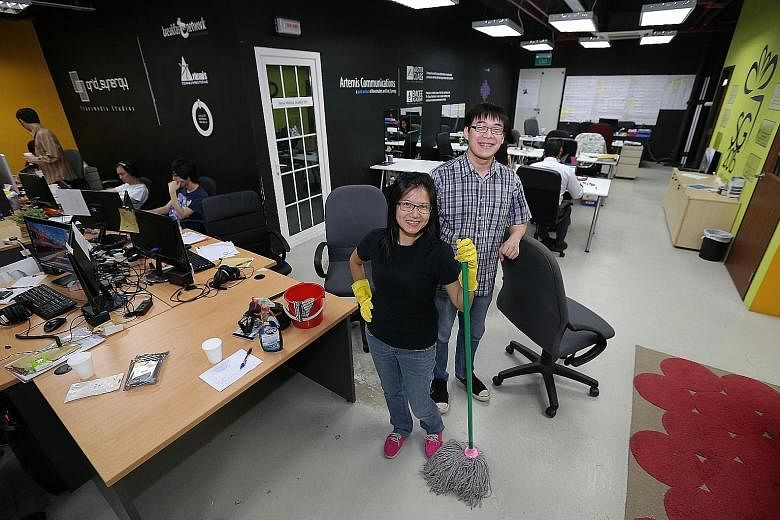 Ms Wendy Tay, who owns and runs a cleaning business, with Entrepreneurs with Disabilities co-founder Joseph Tay at the social enterprise's office.