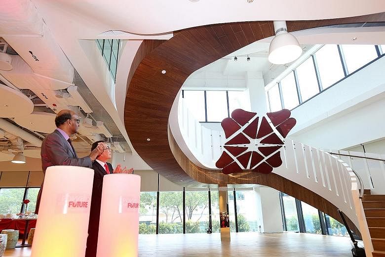 Deputy Prime Minister Tharman Shanmugaratnam and DBS chairman Peter Seah talked about digital and technology disruption in their speeches yesterday at the opening of DBS' new learning centre.