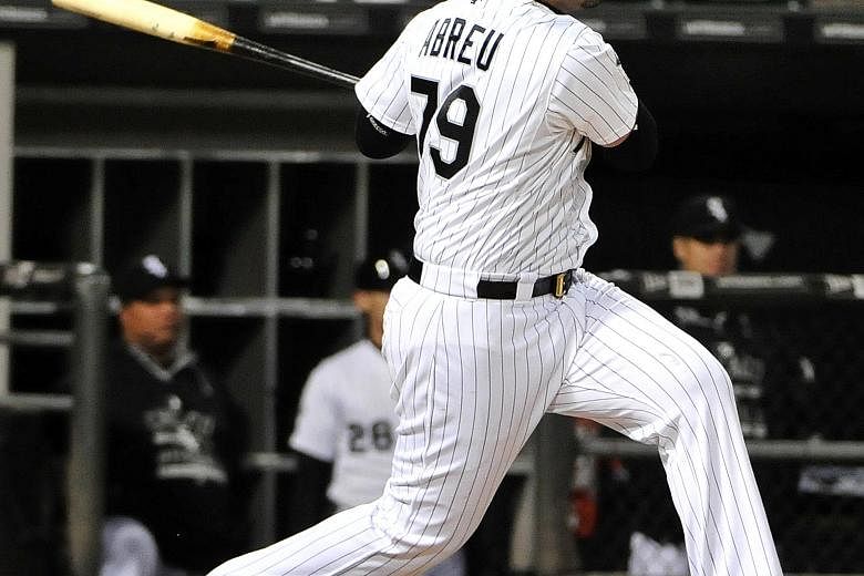 Cuban-born Chicago White Sox first baseman Jose Abreu - the 2014 Major League Baseball rookie of the year - left a son behind when he moved to the United States two years ago.