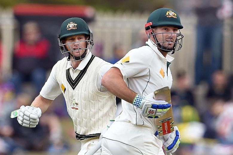 Adam Voges (left) and Shaun Marsh put Australia in control of the first Test against the West Indies in Hobart. Voges hit an unbeaten 269 and Marsh a career-high 182 as Australia declared at 583-4 yesterday.