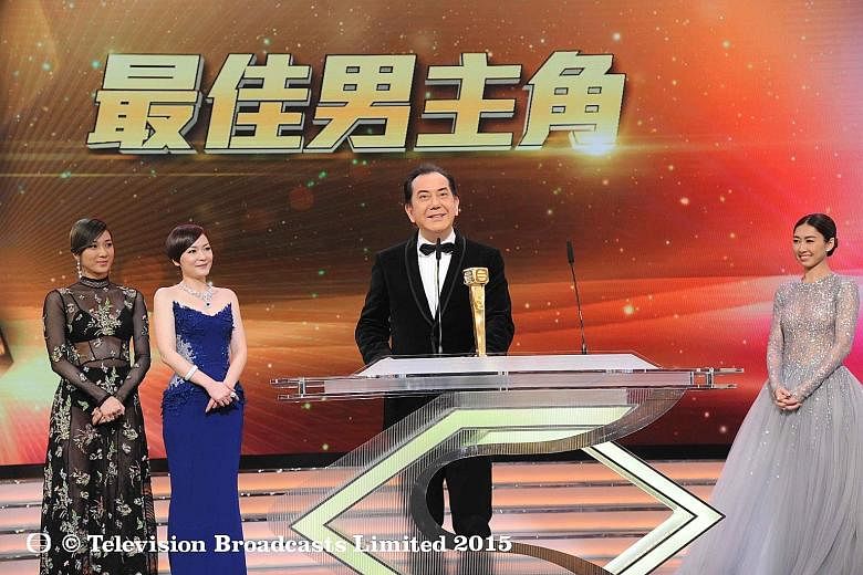 Anthony Wong (right) accepting the Best Actor award, with actresses Linda Chung (from far left) and Kristal Tin as presenters. A stunned and weeping Nancy Wu with her Best Actress trophy.