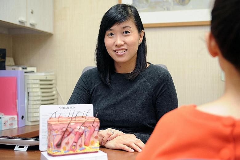 Dr Rachael Teo feels her work is often like an artist's, as her diagnoses rely heavily on her ability to correctly assess shape, colour and texture when examining a patient's skin for conditions such as acne or eczema and even signs of cancer.