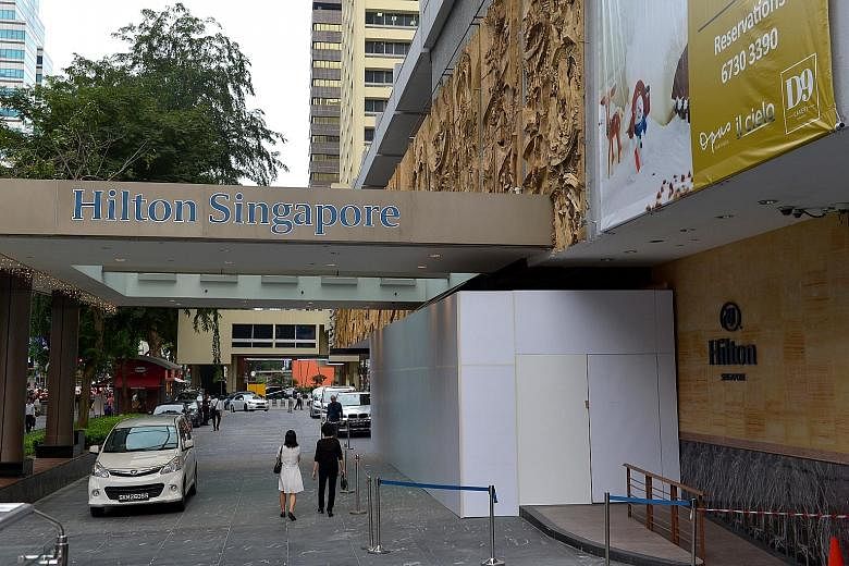 A false ceiling at Hilton hotel's driveway caved in on Sunday, resulting in four people being taken to hospital. Visitors now have to enter the hotel via its shopping gallery entrance.