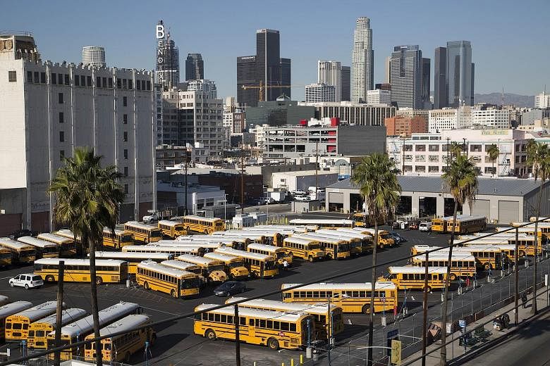 School buses standing idle as all Los Angeles city schools were shut down on Tuesday, in reaction to an e-mailed terror threat. The warning was later deemed a hoax, and schools reopened yesterday.