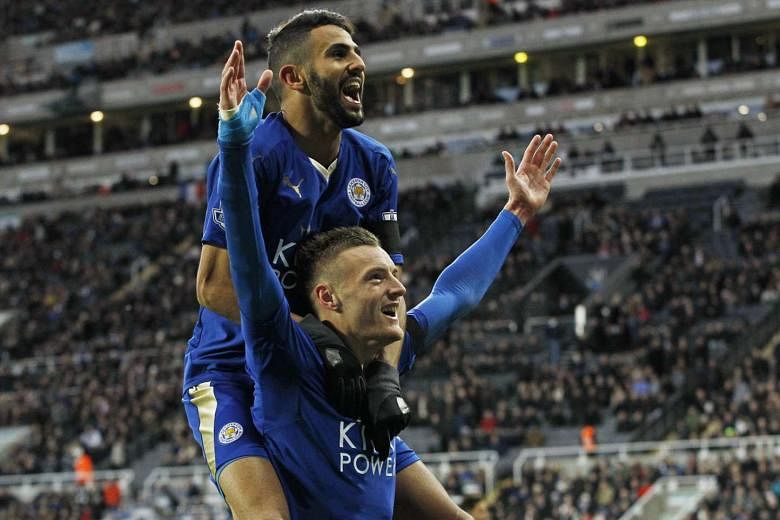 Premier League leaders Leicester City's Jamie Vardy with Riyad Mahrez (top). The low-priced duo have scored 25 per cent more goals this season than big-budget Manchester United.