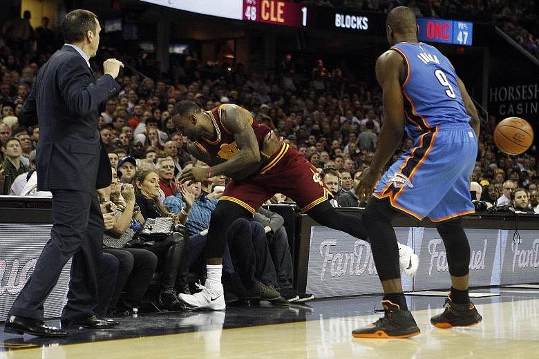 Top: LeBron James crashing into the stands in pursuit of a loose ball. Left: Ellie, wife of golfer Jason Day (above left), being stretchered off after the collision with James.