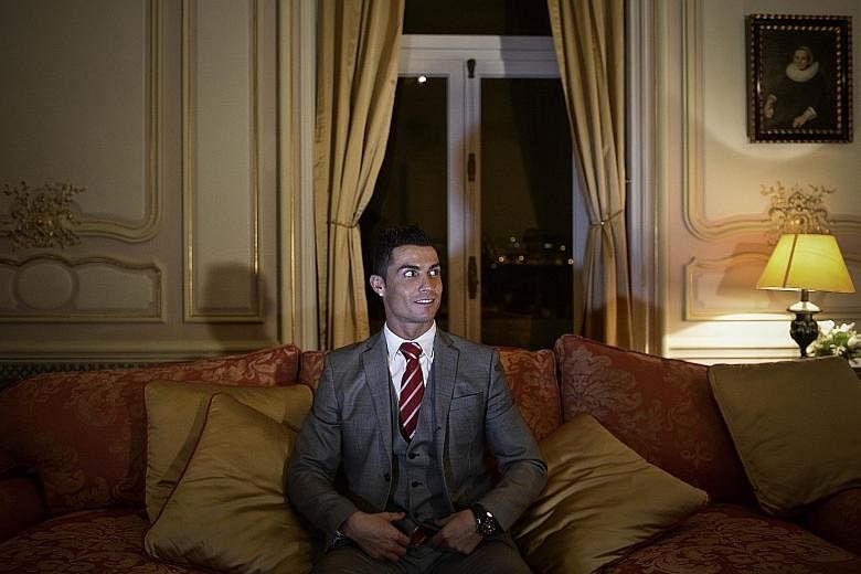 Cristiano Ronaldo, posing at the Pestana Hotel Palace in Lisbon, intends to invest more than $56.8 million in CR7 hotels in three cities linked to his career - Funchal, Lisbon and Madrid - and another in New York.