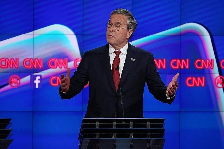 Mr Jeb Bush stood out in Tuesday's Republican presidential debate in Las Vegas, attacking Mr Donald Trump's fitness for the presidency. Mr Bush has been struggling in the polls in his White House bid.