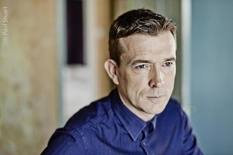 British author David Mitchell returns to the world of his mammoth oeuvre, The Bone Clocks, in Slade House.