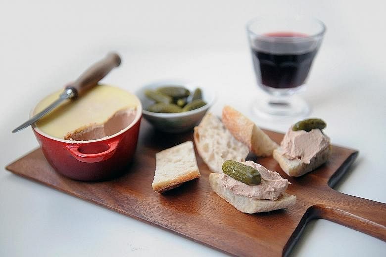 Chicken liver pate, tart cornichons and a warm baguette make a delicious snack.