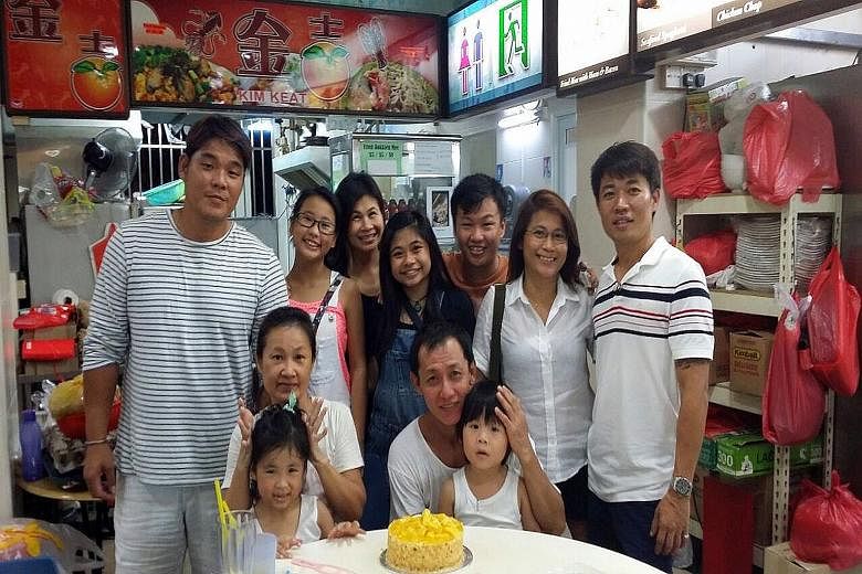Mr Lee with his ex-wife, Carol, (seated) and children and grandchildren. It is his drive to not fail his grandchildren that has kept Mr Lee on the straight and narrow.