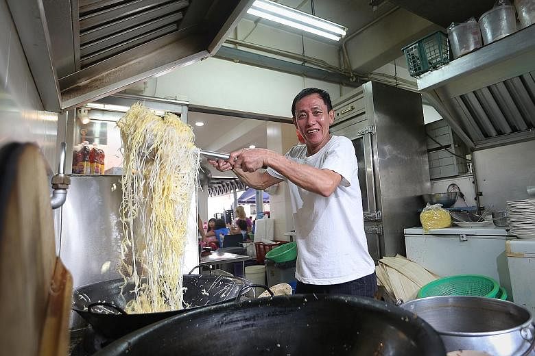 Mr Lee Eng Keat has put his criminal past behind him and is now doing a roaring trade selling Hokkien mee. His stall, Kim Keat Fried Hokkien Mee, is known for serving the noodles in claypots or on opeh leaves.