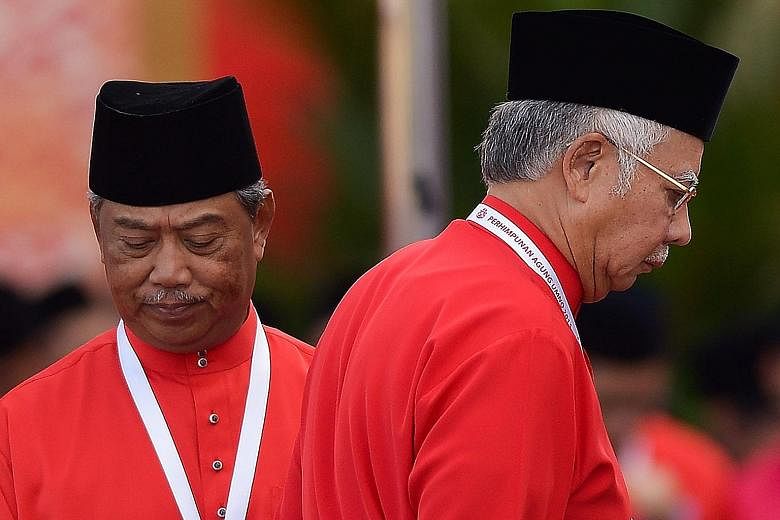 Mr Najib (right) sacked deputy prime minister Muhyiddin Yassin for raising uncomfortable questions.