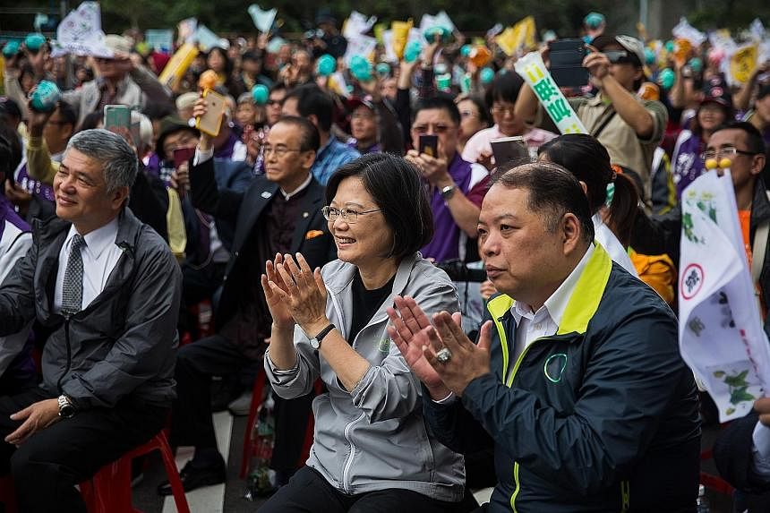 DPP chairman Tsai Ing-wen (above) at the rally yesterday.