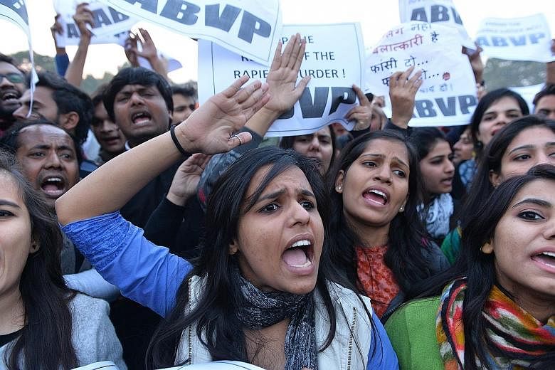 Demonstrators shouting slogans during a rally held in New Delhi yesterday to protest against the release of the man following his completion of a three-year sentence in a reform home. He had been convicted as a juvenile for the 2012 gang rape of a 23