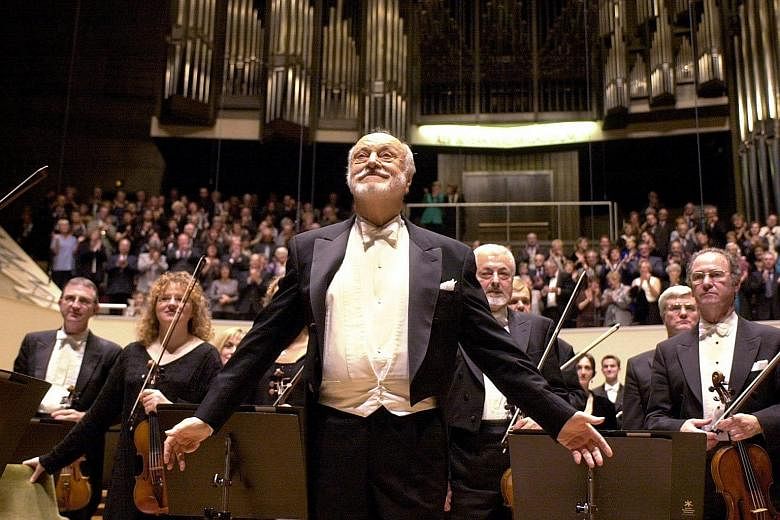 The late Kurt Masur is seen in this 2010 photograph as the conductor of the London Philharmonic Orchestra at a concert in the Gewandhaus in Leipzig, Germany.