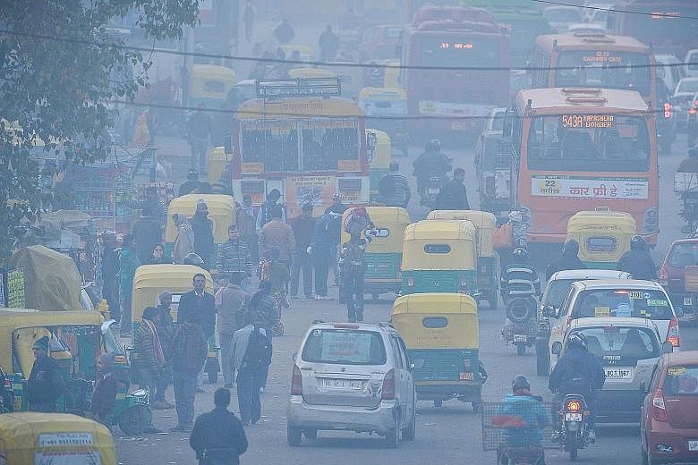 The air in the area around the bus terminus in Delhi's bustling Anand Vihar suburb, which is surrounded by major roads clogged with many old trucks and dust-generating construction activities, routinely tests far worse than the rest of Delhi.