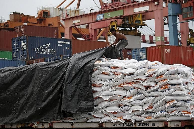 Sacks of rice shipped from Vietnam to Jakarta, Indonesia. If the Asean Economic Community is seen as a single market, it has the potential to be the world's fourth-largest economy.