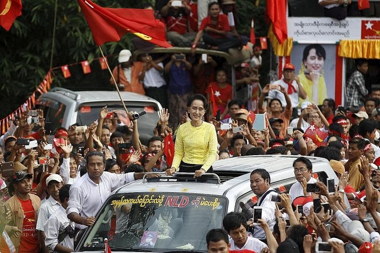 Myanmar pro-democracy leader Aung San Suu Kyi visiting her constituency in Kawhmu township, Yangon division, in October during a campaign rally. Her party swept to a stunning victory in the Nov 8 polls.