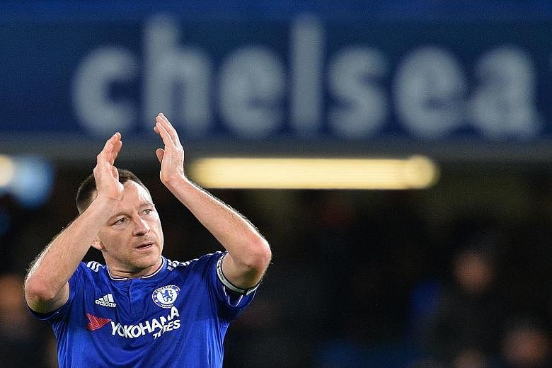 John Terry acknowledging the fans after Chelsea's 3-1 victory against Sunderland on Saturday. He expressed sympathy for the situation faced by Jose Mourinho and said that the players' performances were unacceptable.