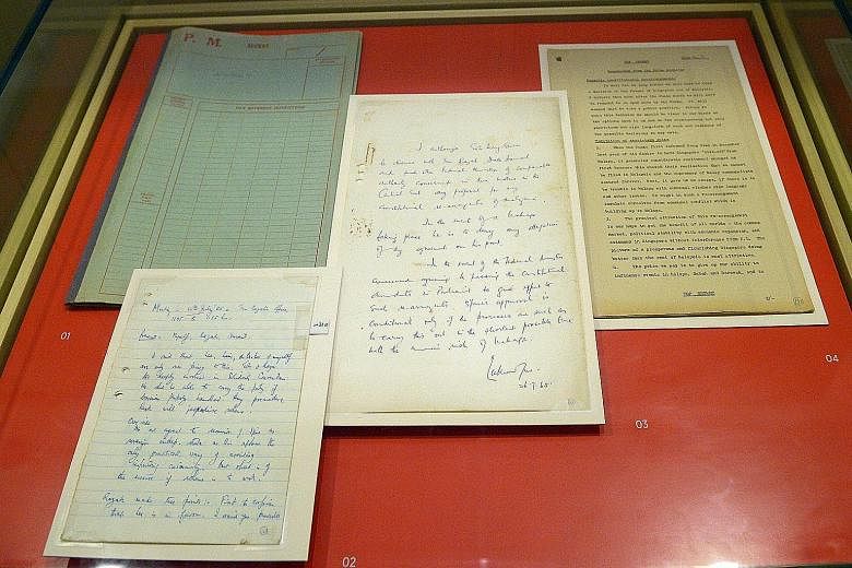 Recently de-classified top secret Cabinet papers, kept in a file code-named Albatross, on display at the National Museum. These were personally compiled by Dr Goh Keng Swee and included documents discussing proposed "constitutional rearrangements" be