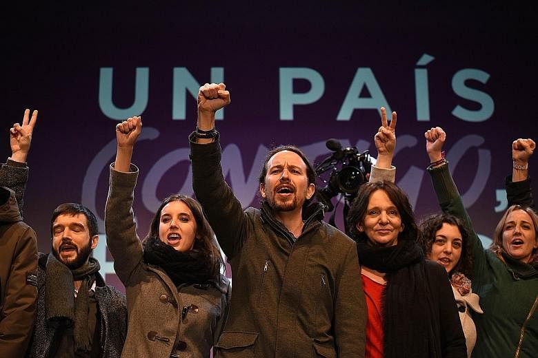 Supporters of left-wing Podemos leader Pablo Iglesias celebrating the results of Spain's closely fought general election in Madrid on Sunday. Voters had rewarded newcomers from the anti-austerity Podemos and the liberal Ciudadanos parties, who betwee