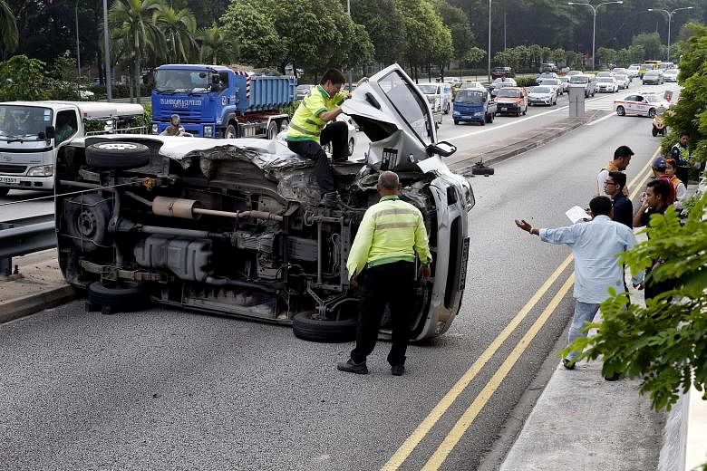 A van flipped on its side on the Pan-Island Expressway yesterday. No injuries were reported from the accident, which occurred along a slip road near the Old Police Academy. Police received a call at around 4.40pm and are investigating.