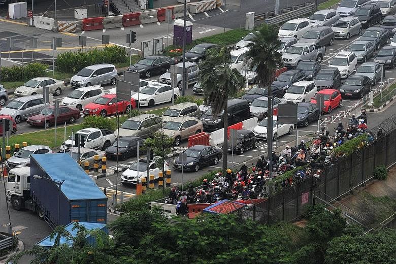 The massive traffic jam at the Causeway during the evening peak period last Friday. ICA said some of the reasons for the jam include the use of wrong, invalid travel documents, inconsiderate motorists and tighter security in the face of terrorist thr