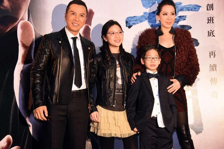 Donnie Yen’s son might look bookish, but he may just become a martial arts master like his father. The 52-year-old action star – who attended the premiere of Ip Man 3 in Taipei on Tuesday with his wife Cecilia, 34, daughter Jasmine, 11, and son James, eig