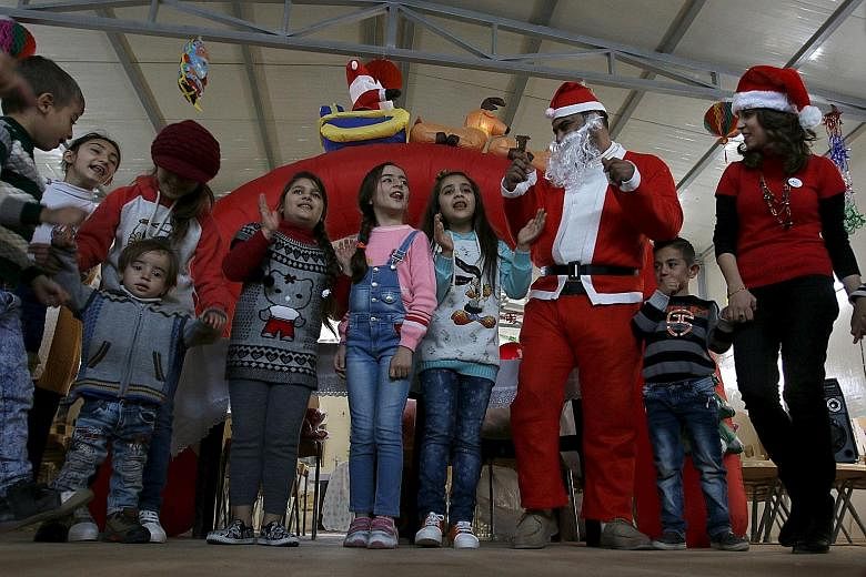 With Christmas falling this year a day after Prophet Muhammad's birthday, Baghdad is holding Christmas celebrations in a sign of brotherhood with Iraq's hard-pressed Christian community. Fireworks will illuminate the Tigris river every night of the w