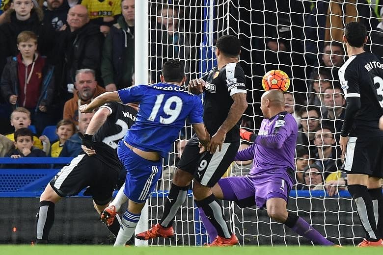 Diego Costa scoring the opening goal against Watford. Guus Hiddink's first match in charge of the Blues ended in a 2-2 draw.