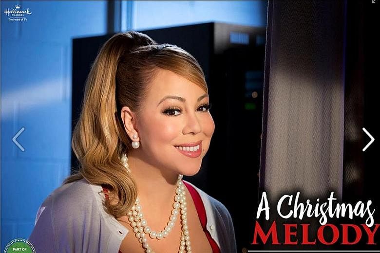 Singer Mariah Carey (above) directed and stars in A Christmas Melody.
