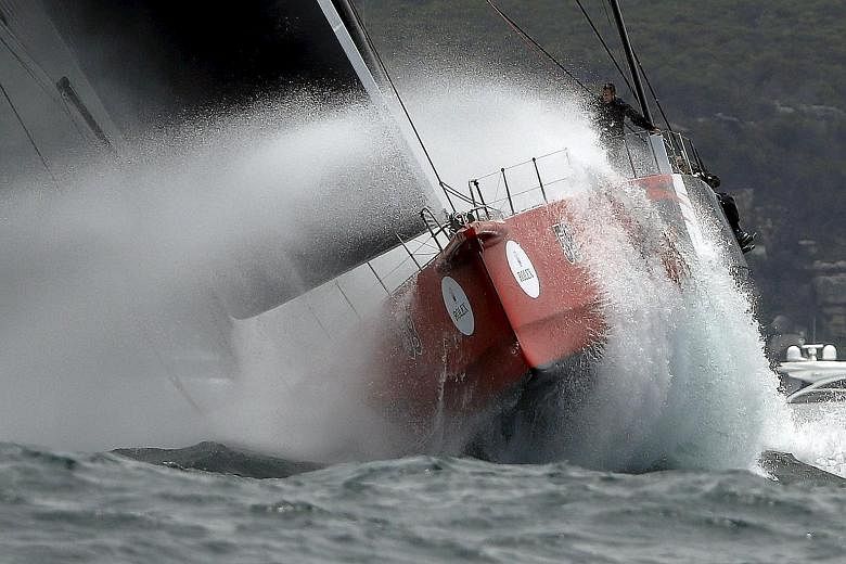 Maxi yacht Comanche powering through heavy swells at the start of the 71st Sydney to Hobart race. Defending champion and eight-time line honours winner Wild Oats XI was among the 23 boats that had dropped out by yesterday.