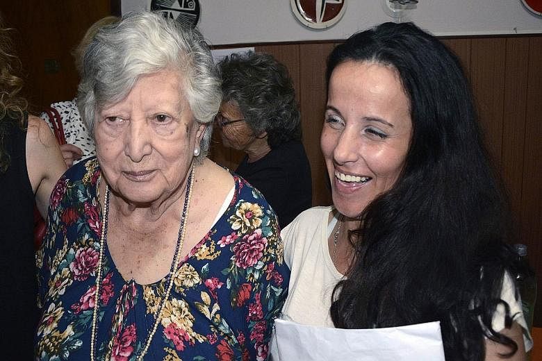 Argentinian activist Maria "Chicha" Mariani on Christmas Eve with the woman originally identified as her granddaughter Clara Anahi.