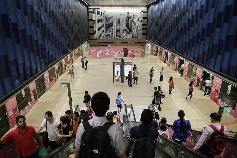 A light morning peak-hour crowd at the Bukit Panjang MRT station yesterday. The 16.6km Downtown Line 2, comprising 12 stations, connects the estate to places such as Little India, Bukit Timah and Bugis - with stops including Botanic Gardens and food 