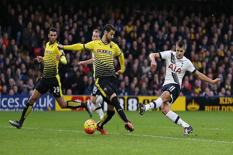 Erik Lamela (right) rifling in the opening goal for Tottenham against Watford at Vicarage Road yesterday. Spurs climb to third in the EPL standings with the 2-1 away win.