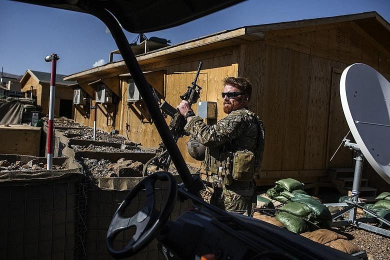 A US special forces soldier in Afghanistan's Parwan province last year. During the peak of the wars in Iraq and Afghanistan, nearly 13,000 Special Operations forces were deployed on missions across the globe, but were mostly assigned to those two cou