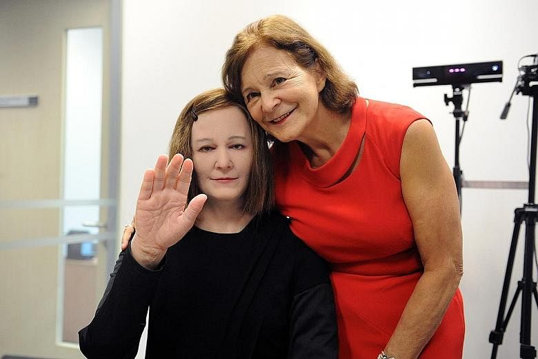 Prof Nadia Thalmann (left) with Nadine, a humanoid that looks almost like a human, with a full head of hair and dewy skin. Researchers hope in future, Edgar 2 (below), now still in a research phase, can be placed in public venues to give practical in