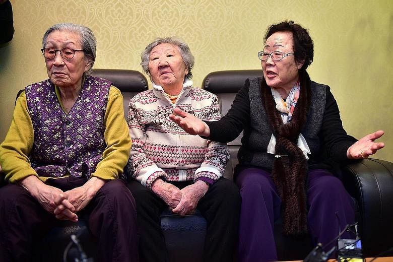 South Koreans (from left) Kim Bok Dong, Gil Won Ok and Lee Yong Soo were forced to become comfort women by the Japanese army during World War II. The writer says promising a form of silence about such crimes in exchange for apology and compensation s