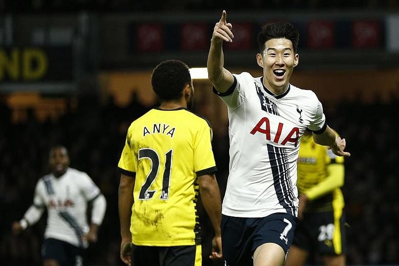 Tottenham Hotspur forward Son Heung Min celebrating after deftly flicking in the winner against Watford on Monday.