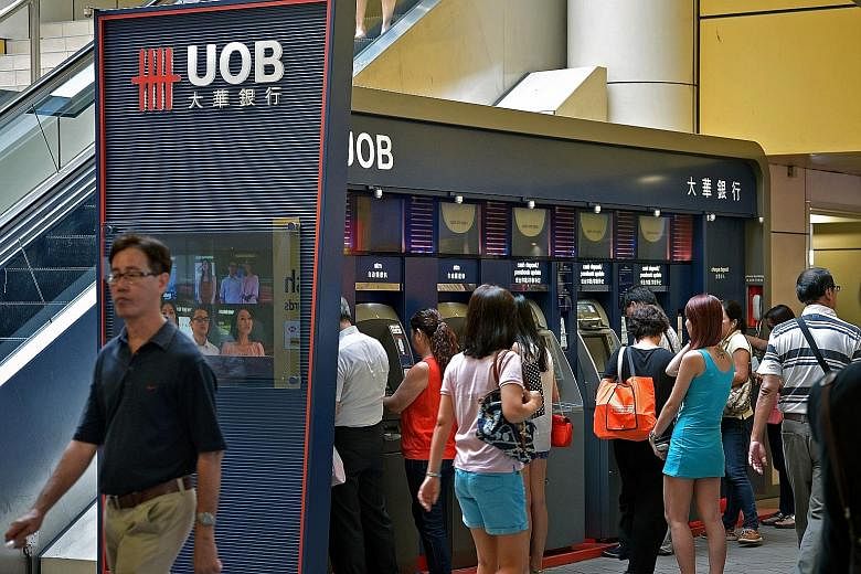 DBS Bank (above) said the new framework will ease disclosure requirements on corporates and could pave the way for more retail bonds next year. Meanwhile, UOB (below) sees selective opportunities for retail bonds next year, potentially from refinanci
