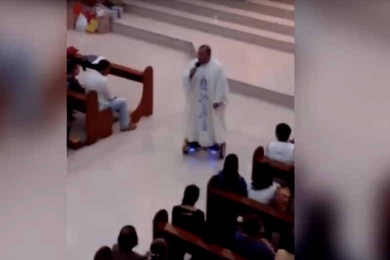 Sidelined Philippine priest sorry after hoverboard Mass stunt | The ...