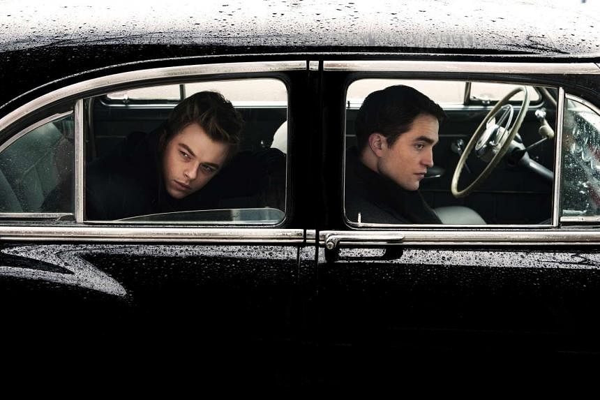 Dane DeHaan (left) as the late James Dean and Robert Pattinson (right) as photographer Dennis Stock in the biopic Life.